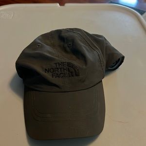 The North Face Hat. Never worn, but has a few marks from storage. Great shape